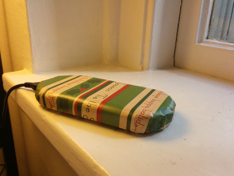 Illustration for article titled Disguise Ugly Electronics by Wrapping Them for the Holidays